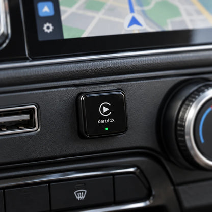 Kerbfox DashLink plugged into a car USB port with maps on the screen