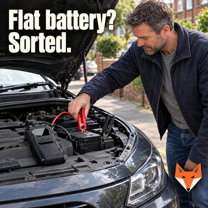 Man jump starting a car with the Kerbfox Revive Mini